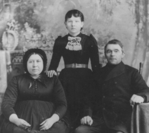 Original title:  Funk, Johann (1836-1917) - Bishop Johann Funk with his third wife Louise and foster daughter Justina Klassen, taken ca. 1890.
Source: Mennonite Heritage Centre Photograph Collection 205:1.