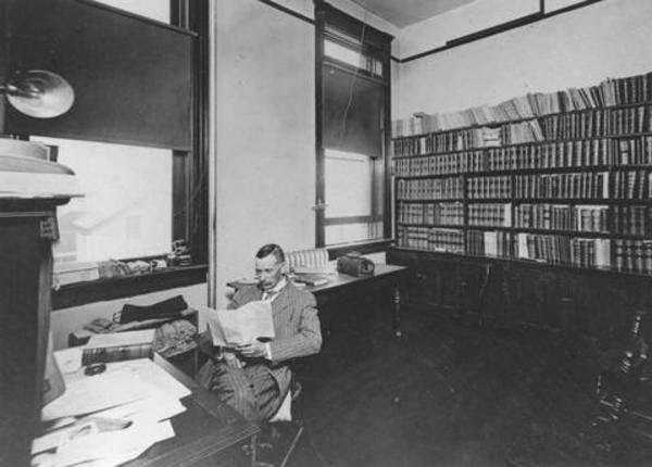 Titre original :  Photograph of J.C.F. Bown seated at desk in his law office. Annotated on back: 